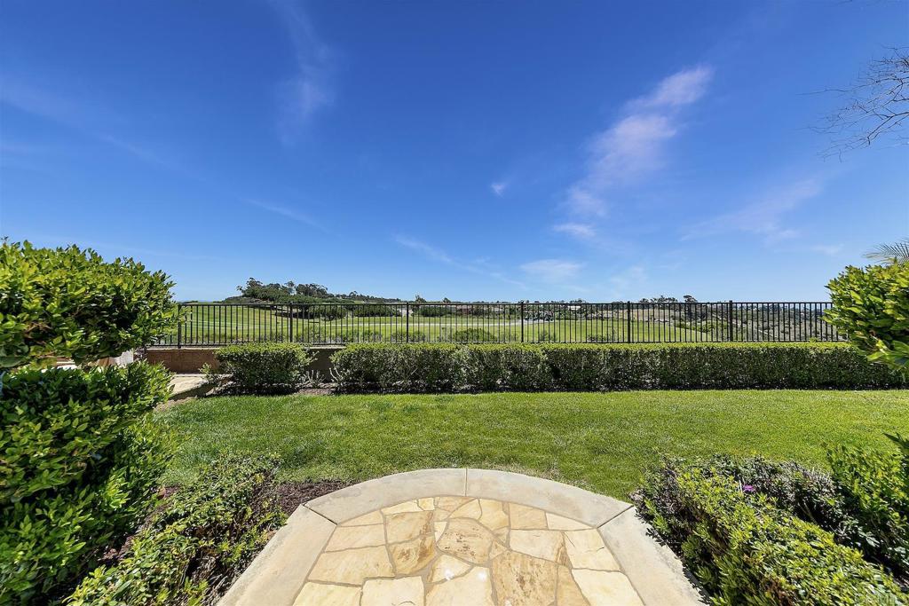 1435 Ravean Court Encinitas, CA 92024 - Photo 38 of 48 an aerial view of a golf course with a lake view