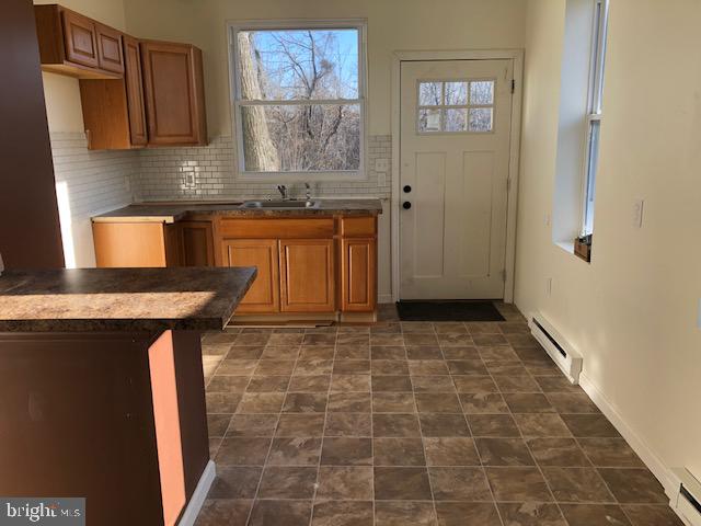 328 Rutherford Avenue Trenton, NJ 08618 - Photo 6 of 23 Full Kitchen with countertops for bar stools