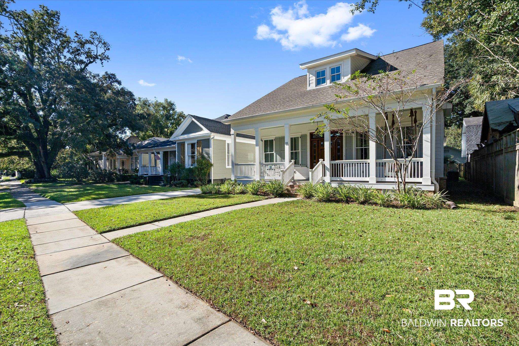 15 Semmes Avenue Mobile, AL 36604 - Photo 28 of 43 View of front facade featuring covered porch and a front yard