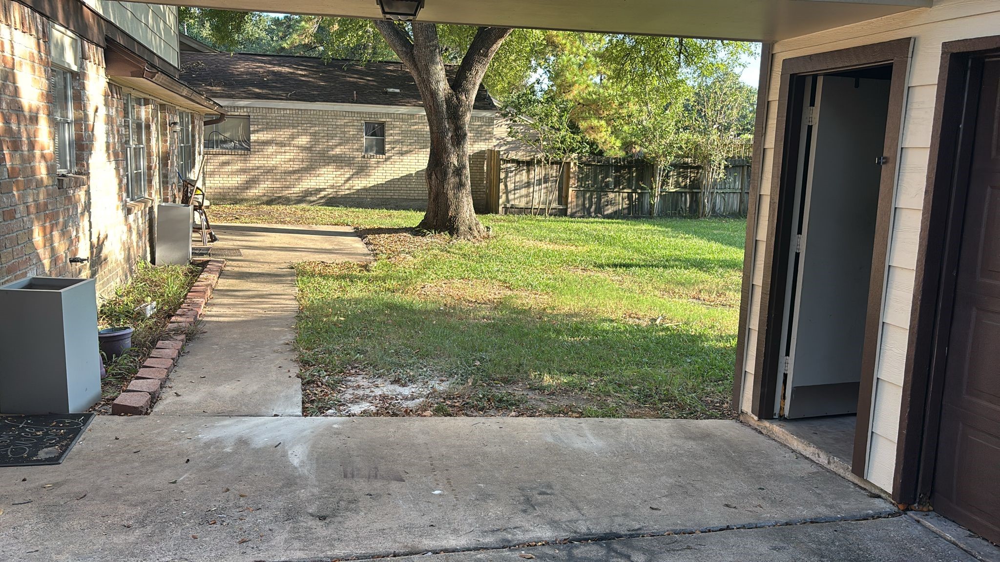 16407 Southampton Drive Spring, TX 77379 - Photo 11 of 12 a view of a trees in front of a house with a big yard