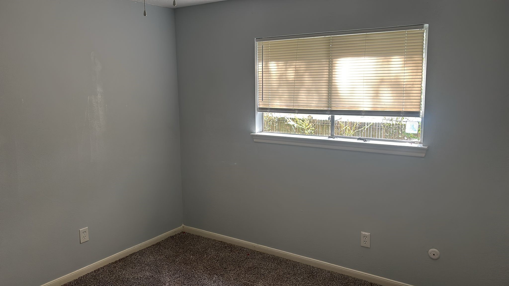 16407 Southampton Drive Spring, TX 77379 - Photo 7 of 12 an empty room with a window