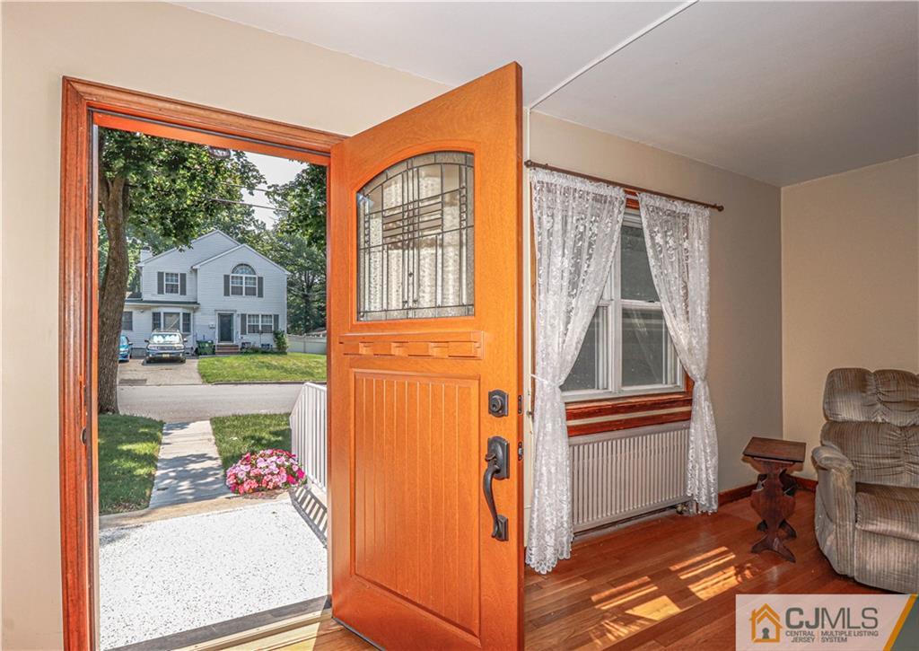 55 3rd Street Edison, NJ 08837 - Photo 2 of 27 a view of living room with a window and outer view
