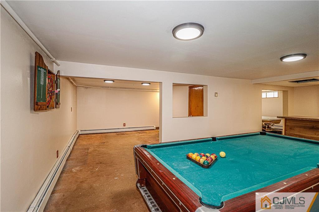 55 3rd Street Edison, NJ 08837 - Photo 15 of 27 a room with games and windows