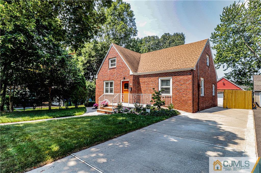 55 3rd Street Edison, NJ 08837 - Photo 21 of 27 a front view of a house with garden