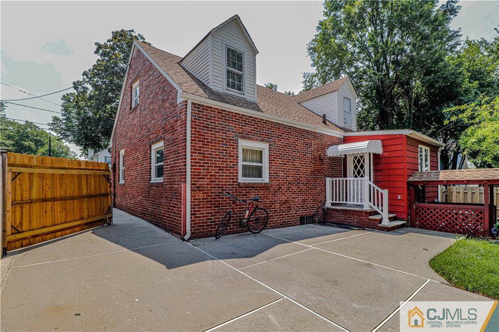 55 3rd Street Edison, NJ 08837 - Photo 24 of 27 a view of a house with a yard