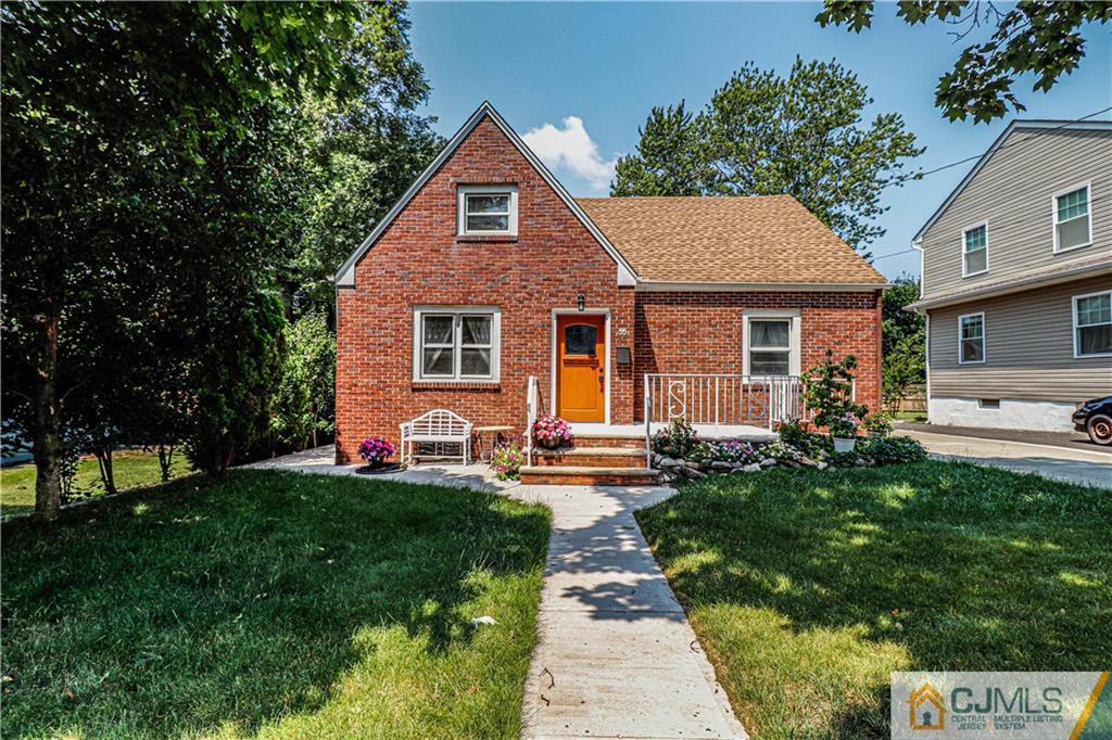 55 3rd Street Edison, NJ 08837 - Photo 25 of 27 a front view of a house with a yard