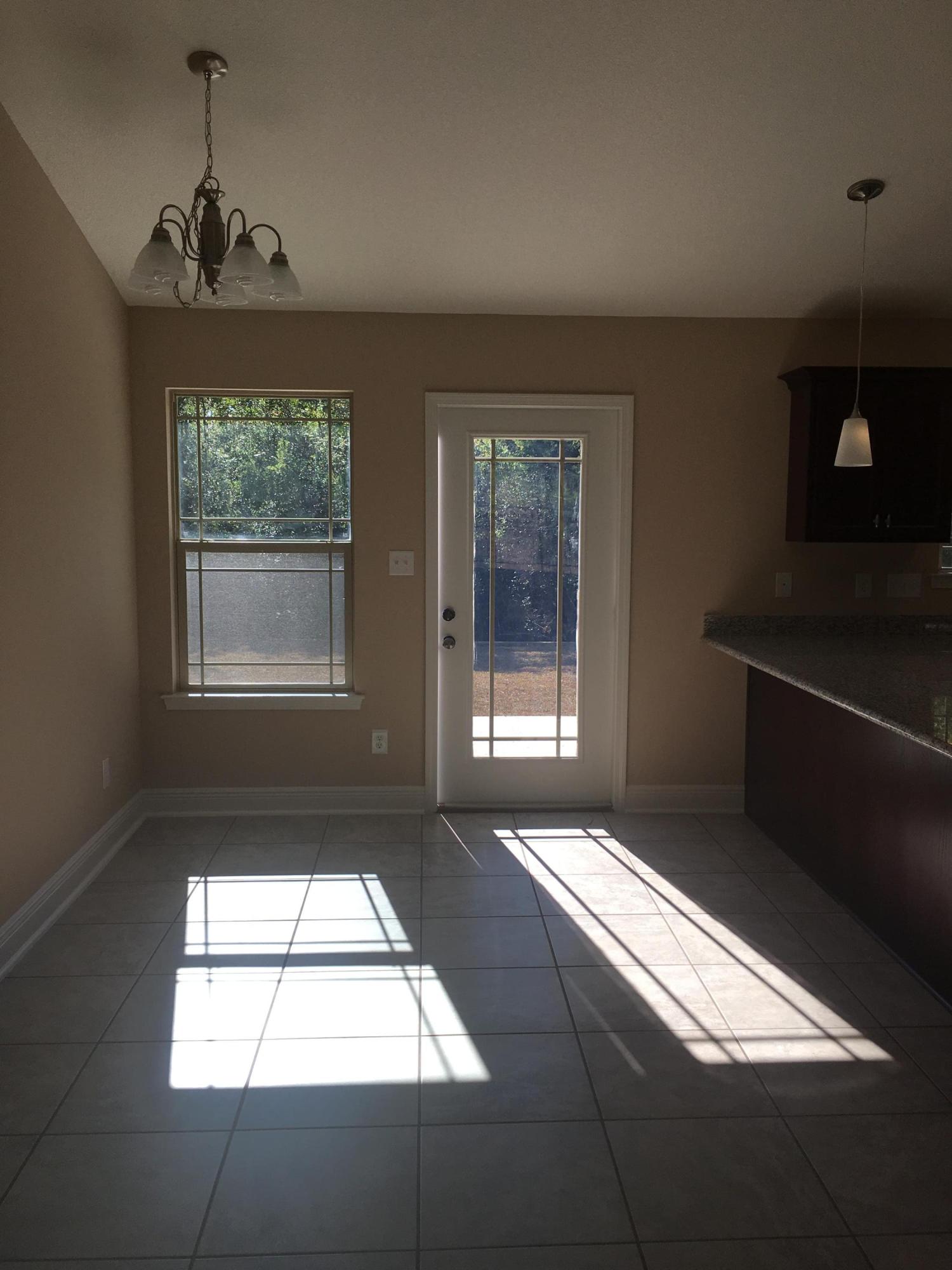 1487 Oakhill Road Gulf Breeze, FL 32563 - Photo 5 of 8 Dining Area