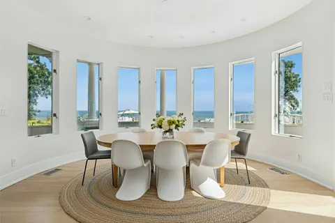 a spacious bathroom with a bathtub and shower