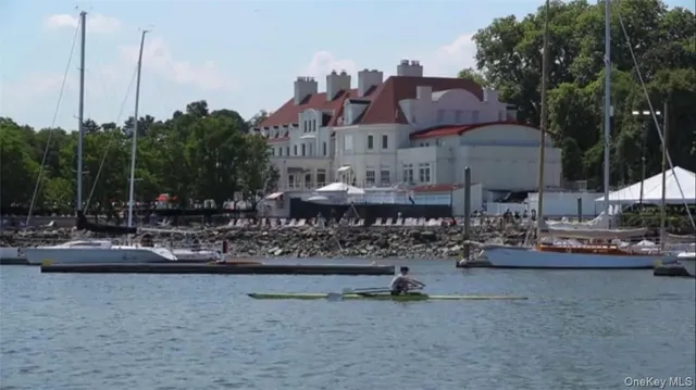 a view of a water fountain in front of a house