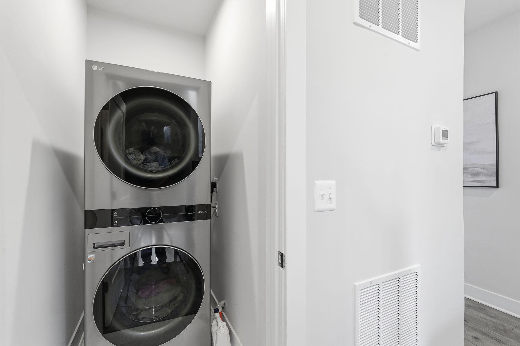 1702 Bandit Loop, Unit 19B Reston, VA 20190 - Photo 11 of 31 Laundry on bedroom level.