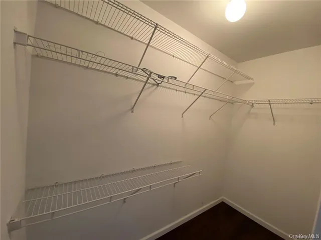 a view of a room with racks on the wall