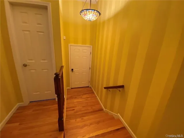 a view of a bathroom with a shower and a tub