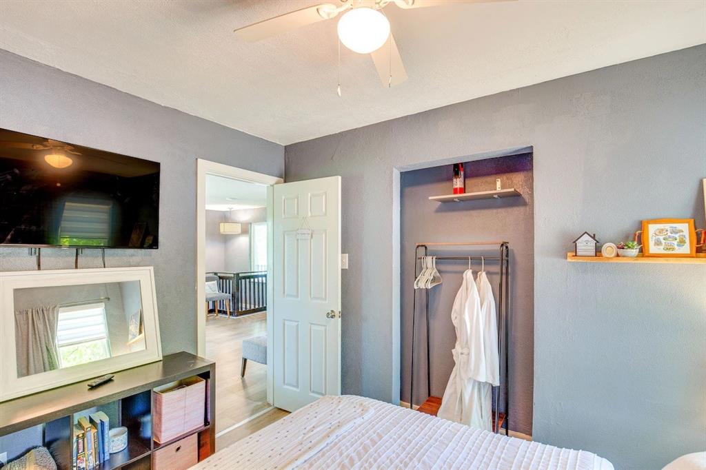 7110 Apache Circle Mabank, TX 75156 - Photo 17 of 36 a bedroom with a bed and a flat screen tv