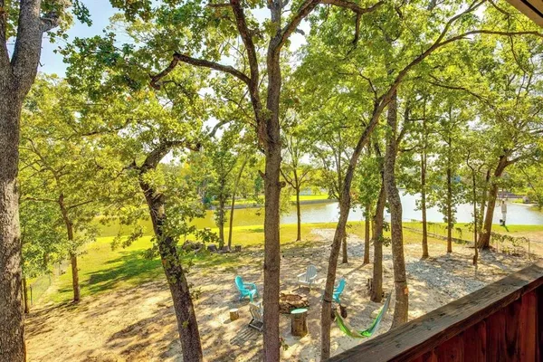 a view of outdoor space with lots of trees