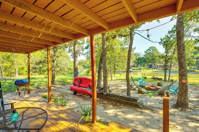 a view of a swimming pool with a patio
