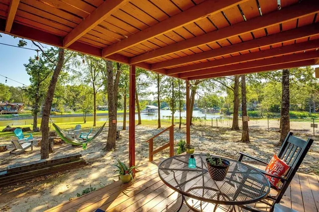 a view of swimming pool with outdoor seating