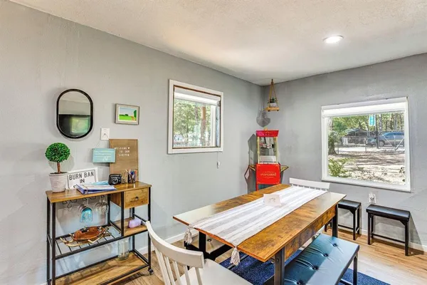 a room with furniture and a window