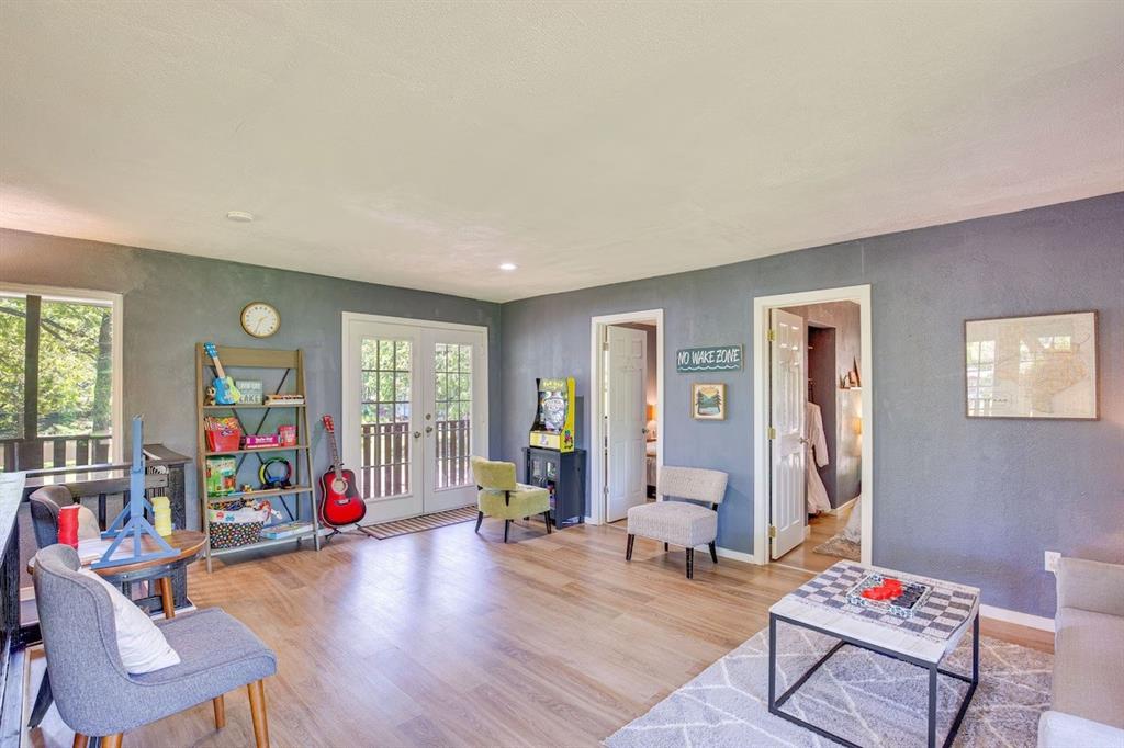 7110 Apache Circle Mabank, TX 75156 - Photo 9 of 36 a living room with furniture and a wooden floor