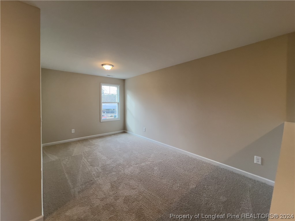 30 Pointer (lot 2) Way Parkton, NC 28371 - Photo 17 of 26 a view of an empty room with windows
