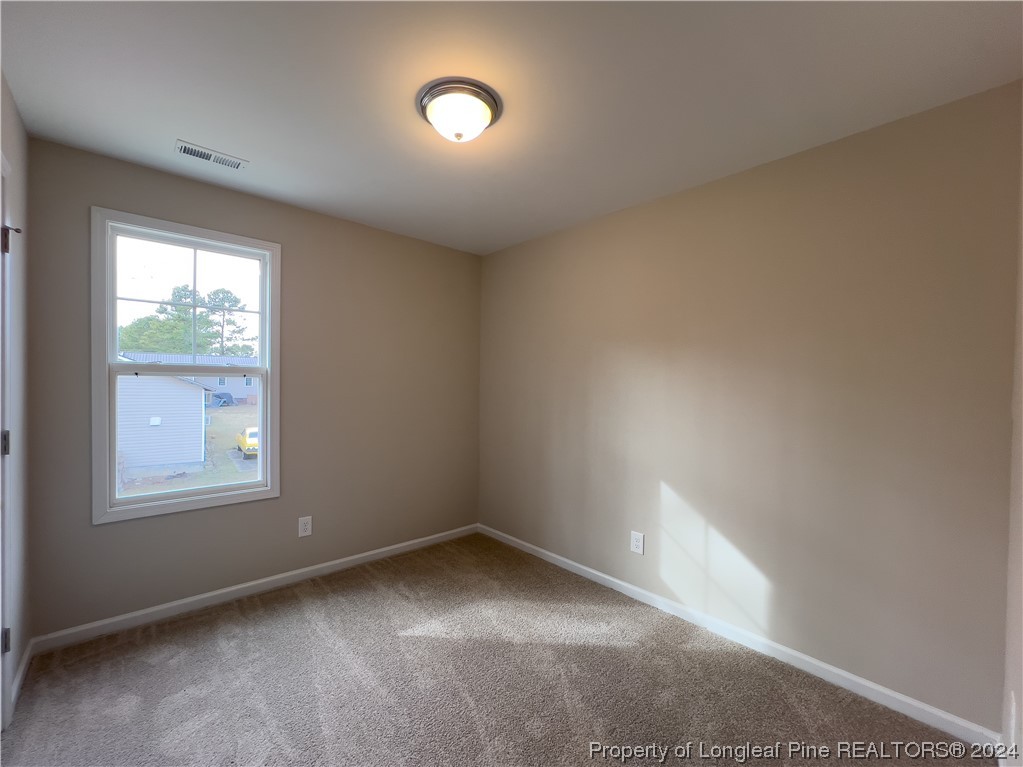 30 Pointer (lot 2) Way Parkton, NC 28371 - Photo 18 of 26 an empty room with a window