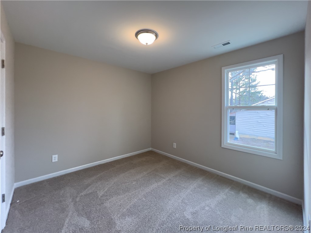 30 Pointer (lot 2) Way Parkton, NC 28371 - Photo 19 of 26 an empty room with a window