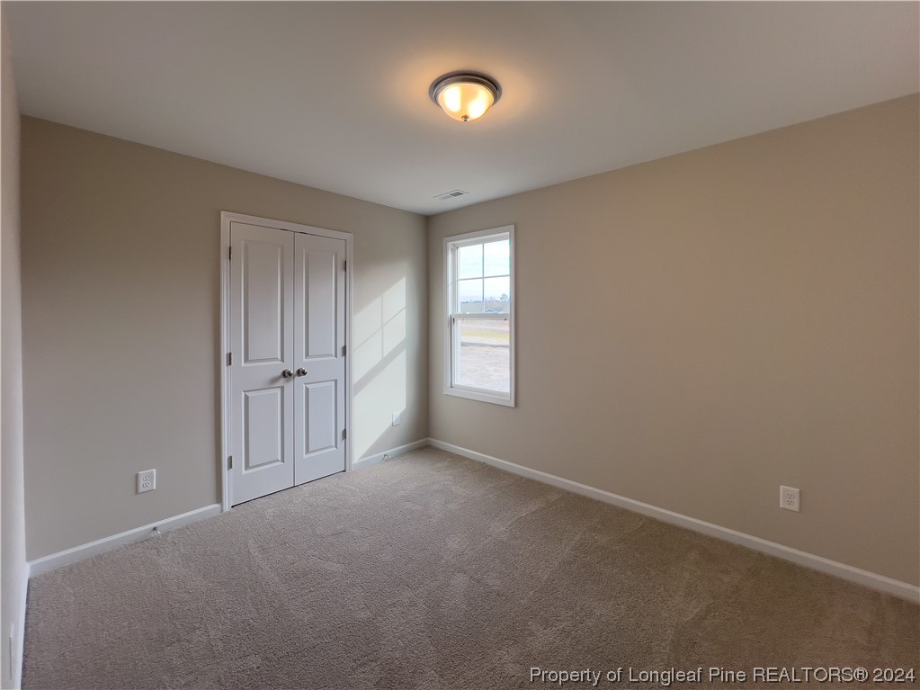30 Pointer (lot 2) Way Parkton, NC 28371 - Photo 20 of 26 a view of an empty room with a window