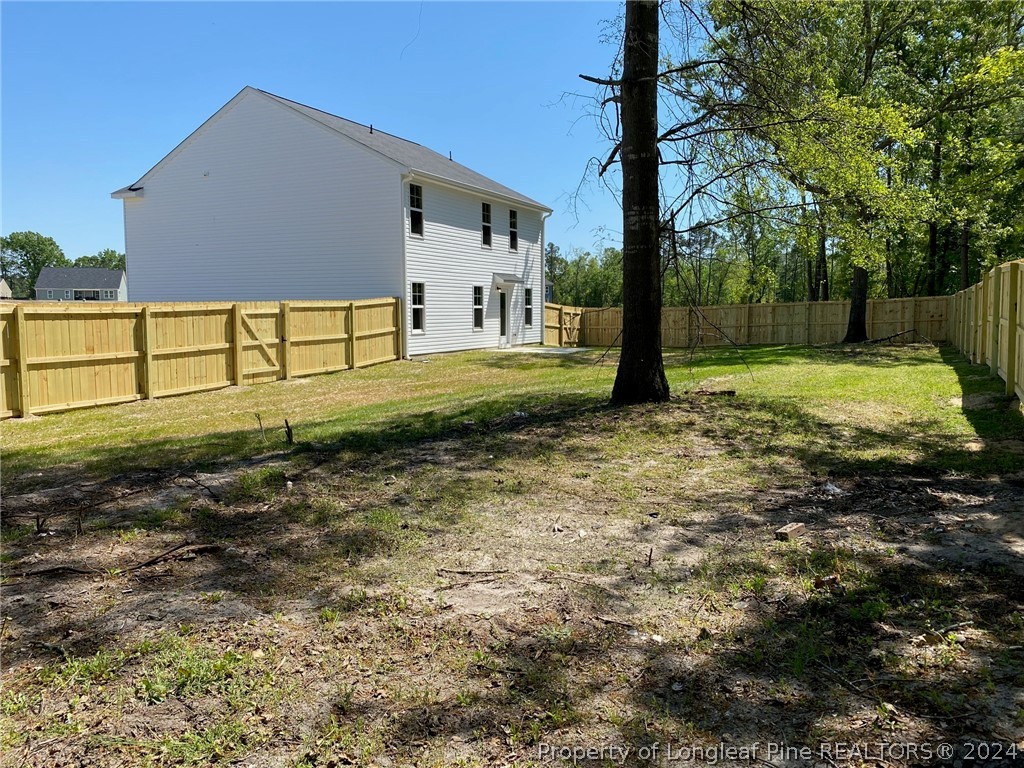 30 Pointer (lot 2) Way Parkton, NC 28371 - Photo 23 of 26 a view of a house with a yard