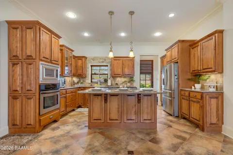 $615,000 | 122 Maple Grove Lane, Youngsville, LA 70592