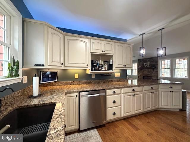 1156 Providence Church Road Hedgesville, WV 25427 - Photo 28 of 101 a kitchen with stainless steel appliances granite countertop a stove a sink and a microwave