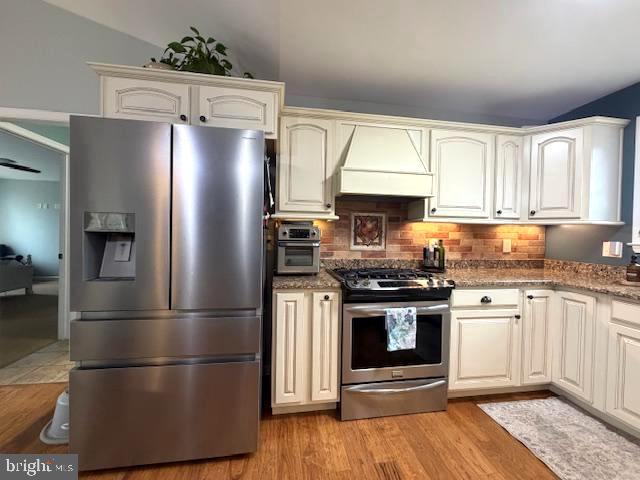 1156 Providence Church Road Hedgesville, WV 25427 - Photo 30 of 101 a kitchen with stainless steel appliances granite countertop a refrigerator stove a sink and dishwasher