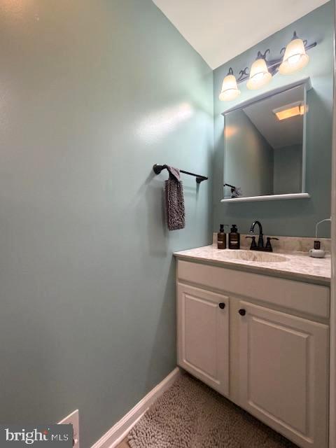 1156 Providence Church Road Hedgesville, WV 25427 - Photo 46 of 101 a bathroom with a sink and a mirror