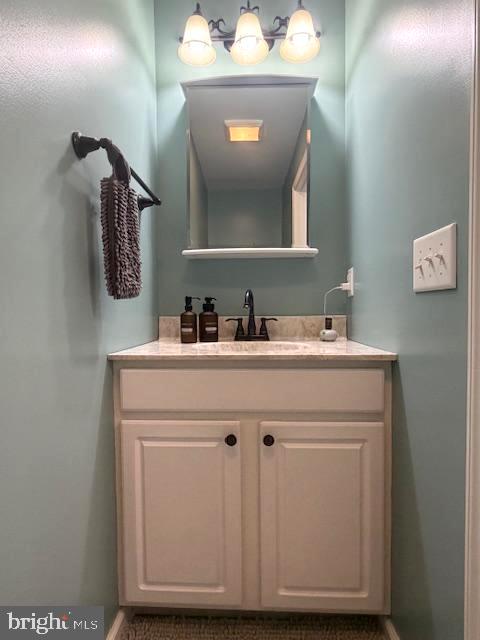1156 Providence Church Road Hedgesville, WV 25427 - Photo 47 of 101 a bathroom with a sink and a mirror