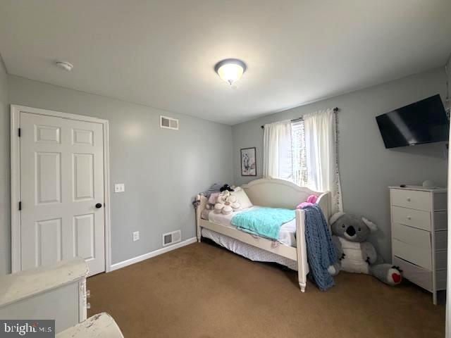 1156 Providence Church Road Hedgesville, WV 25427 - Photo 54 of 101 a bedroom with a bed and a flat screen tv