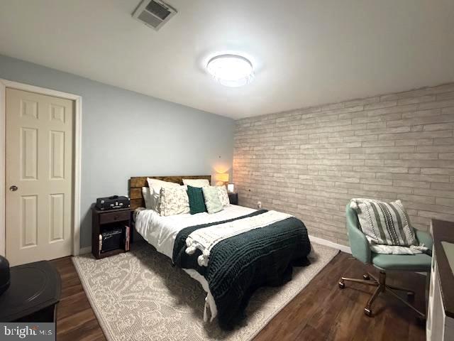 1156 Providence Church Road Hedgesville, WV 25427 - Photo 55 of 101 a bedroom with a bed and a chair