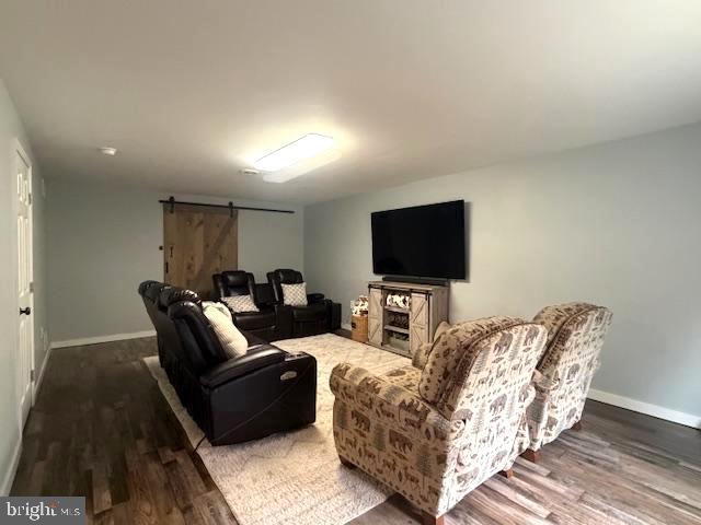1156 Providence Church Road Hedgesville, WV 25427 - Photo 65 of 101 a living room with furniture and a flat screen tv