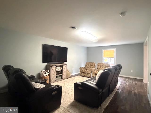 1156 Providence Church Road Hedgesville, WV 25427 - Photo 67 of 101 a living room with furniture and a flat screen tv