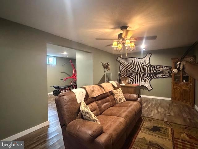1156 Providence Church Road Hedgesville, WV 25427 - Photo 72 of 101 a living room with furniture and a chandelier