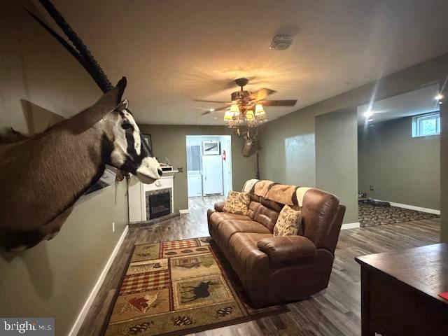 1156 Providence Church Road Hedgesville, WV 25427 - Photo 73 of 101 a living room with furniture and a chandelier