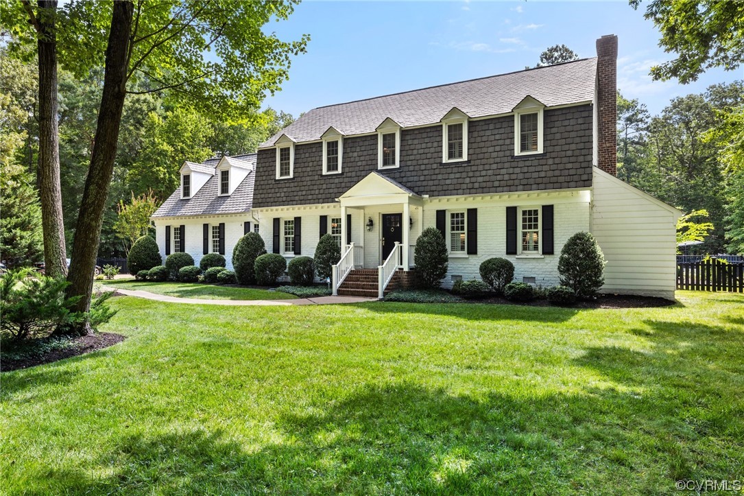 2921 Barrow Place Midlothian, VA 23113 - Photo 1 of 41 a front view of a house with a yard and trees