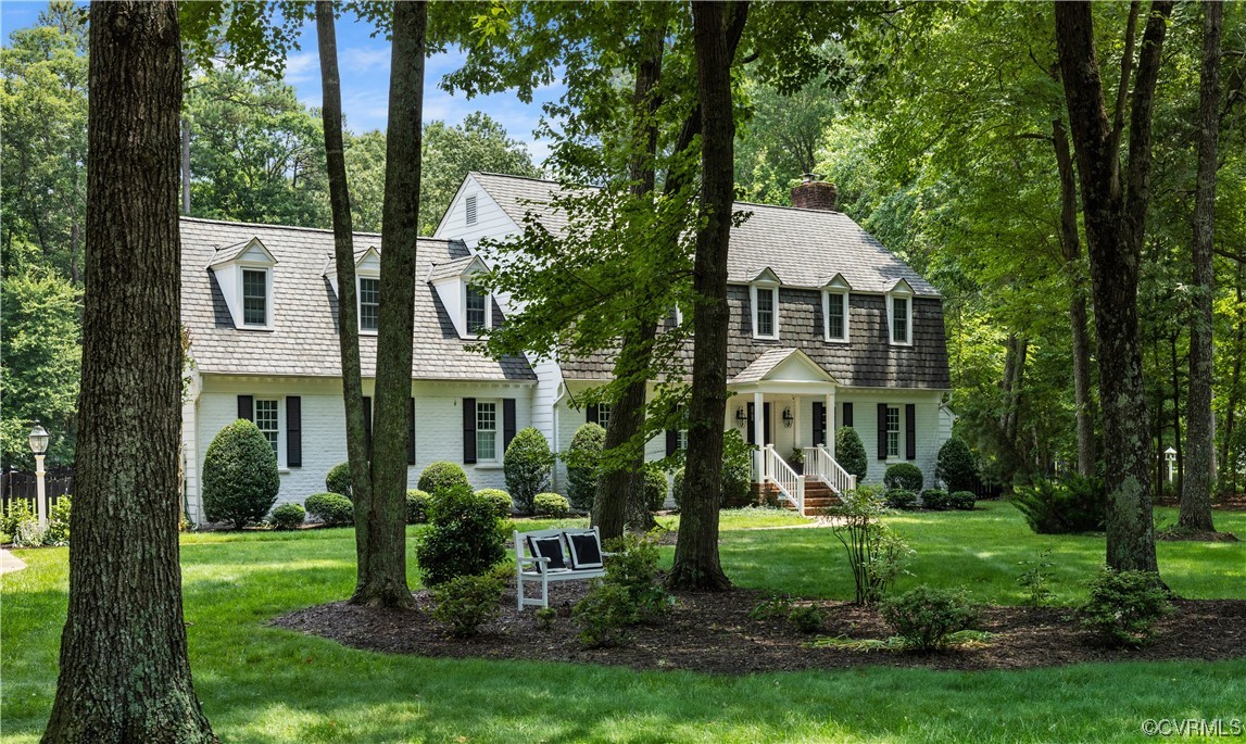 2921 Barrow Place Midlothian, VA 23113 - Photo 2 of 41 a view of a house with a yard and potted plants and large trees