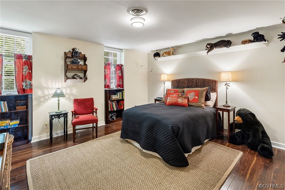 2921 Barrow Place Midlothian, VA 23113 - Photo 24 of 41 a bedroom with a bed and wooden floor