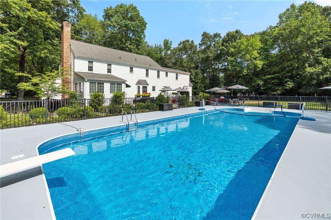 2921 Barrow Place Midlothian, VA 23113 - Photo 37 of 41 a view of a swimming pool with lounge chair