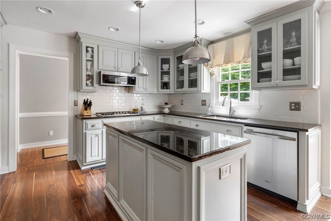 2921 Barrow Place Midlothian, VA 23113 - Photo 8 of 41 a kitchen with stainless steel appliances granite countertop a sink stove and refrigerator