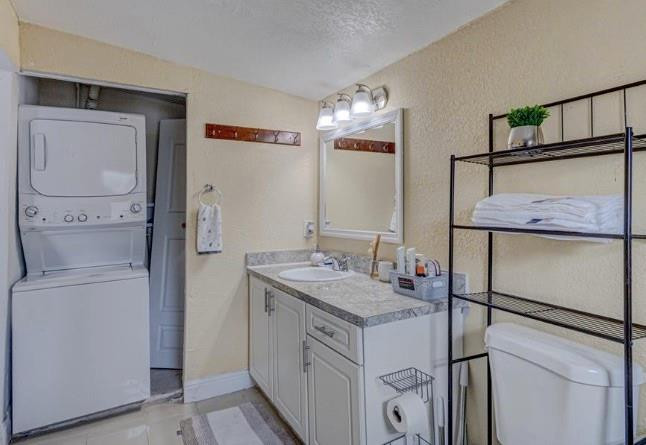 1105 West 34th Street Riviera Beach, FL 33404 - Photo 15 of 15 a bathroom with a sink a vanity and a mirror