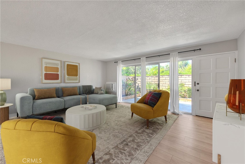 3096 Panorama Road, Unit A Riverside, CA 92506 - Photo 1 of 1 a living room with furniture and a flat screen tv
