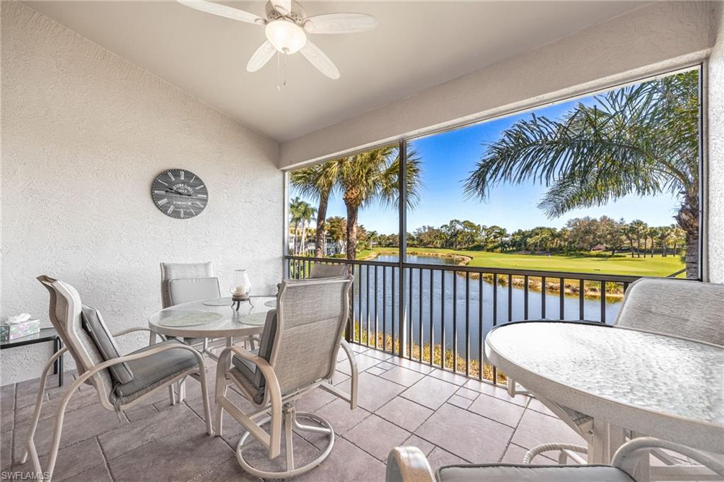 9209 Spring Run Boulevard, Unit 2003 Estero, FL 34135 - Photo 18 of 32 a view of a chairs and table in patio