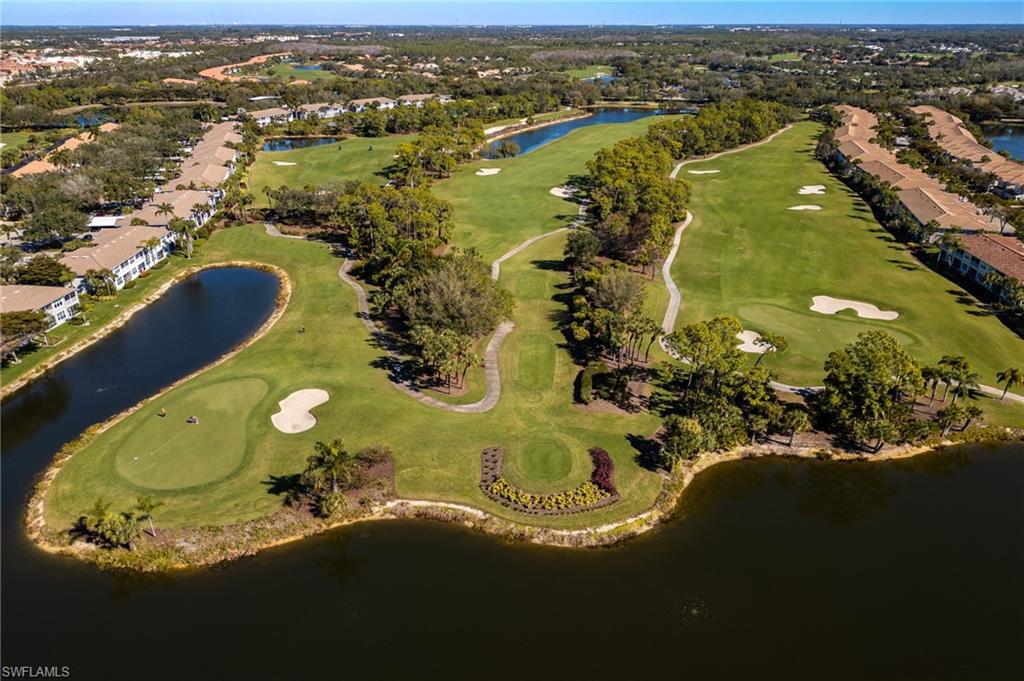 9209 Spring Run Boulevard, Unit 2003 Estero, FL 34135 - Photo 27 of 32 an aerial view of a residential houses with outdoor space