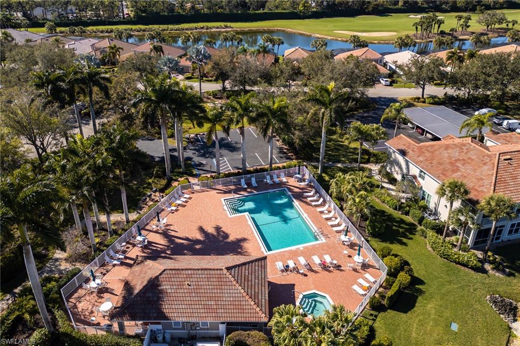 9209 Spring Run Boulevard, Unit 2003 Estero, FL 34135 - Photo 30 of 32 an aerial view of a house with a yard basket ball court and outdoor seating