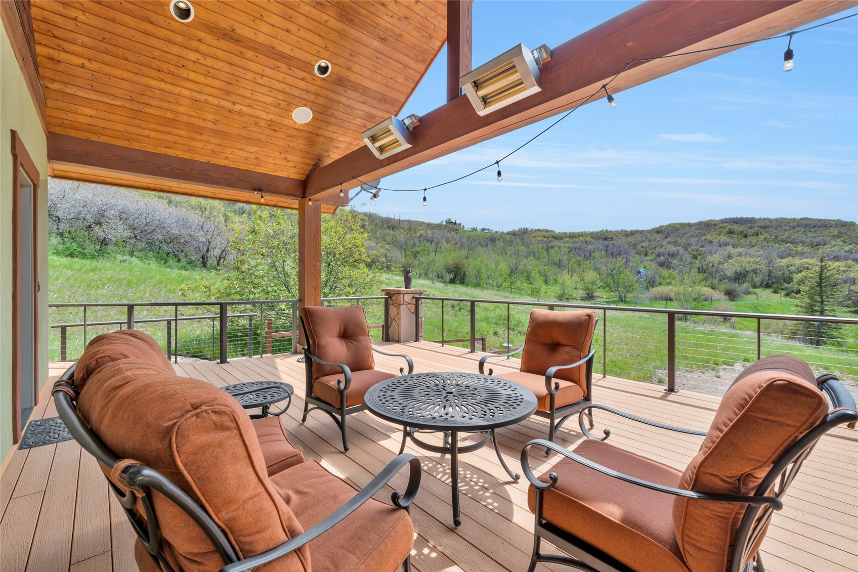 31485 Deerwood Ranch Road Steamboat Springs, CO 80487 - Photo 11 of 49 a view of a chairs and table in patio
