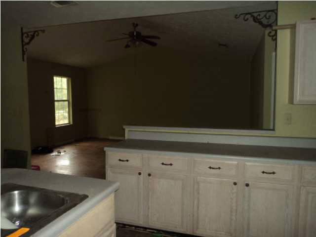 1150 Dennis Road Walnut Grove, MS 39189 - Photo 7 of 7 View into Living Area from Kitchen